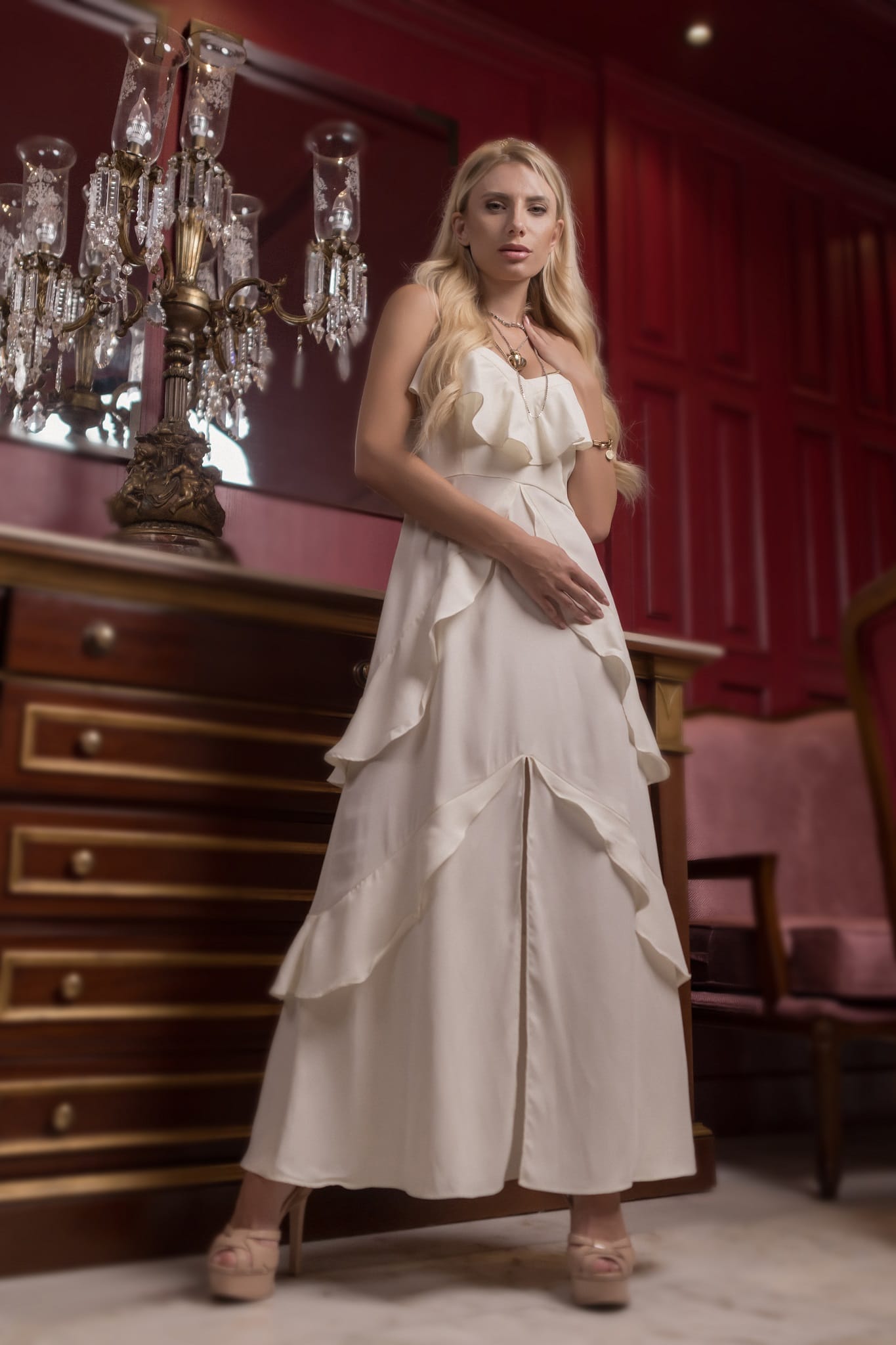 model wearing white chiffon silk dress