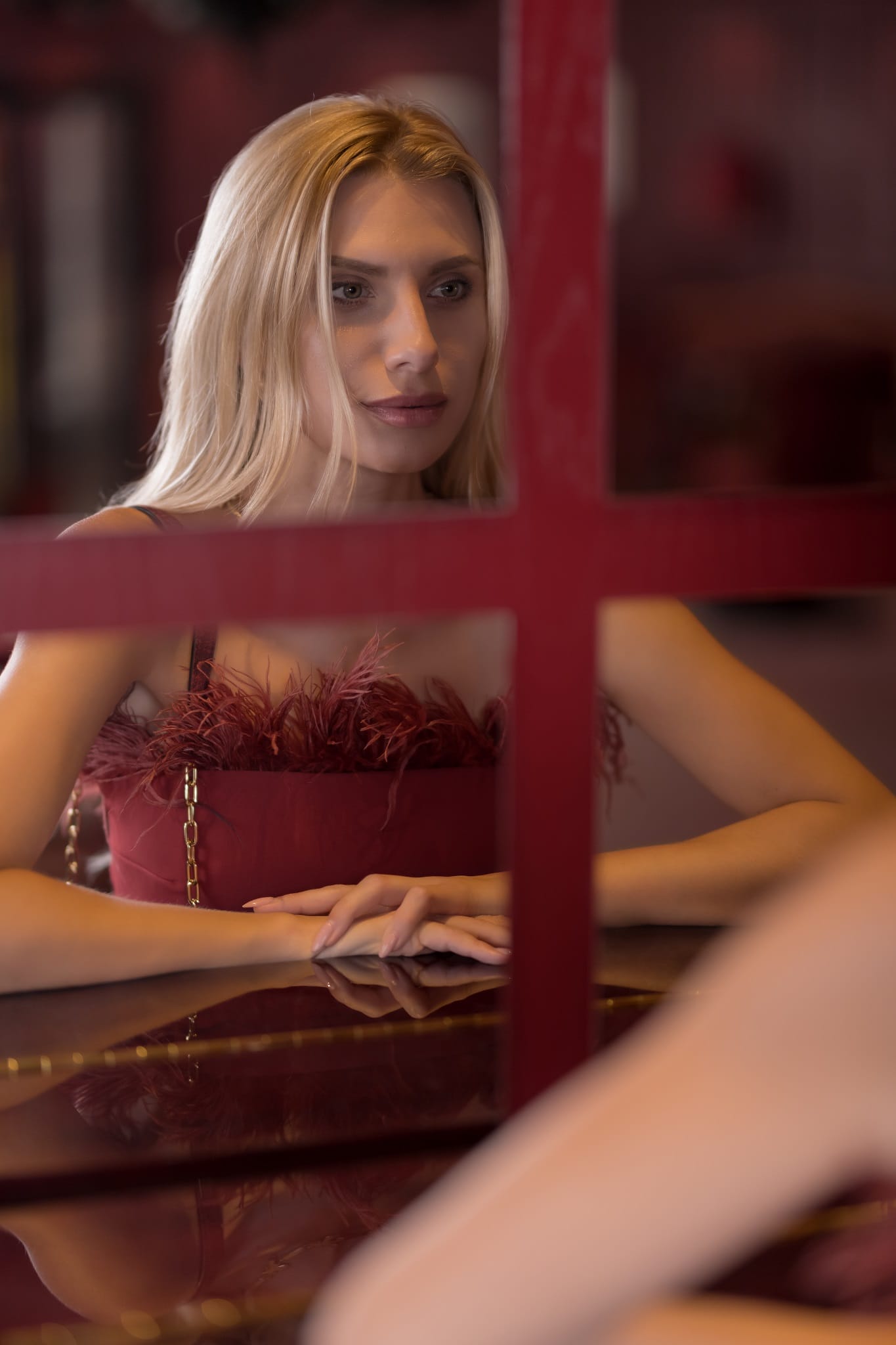 a model wearing maxi dress in terra cotta color