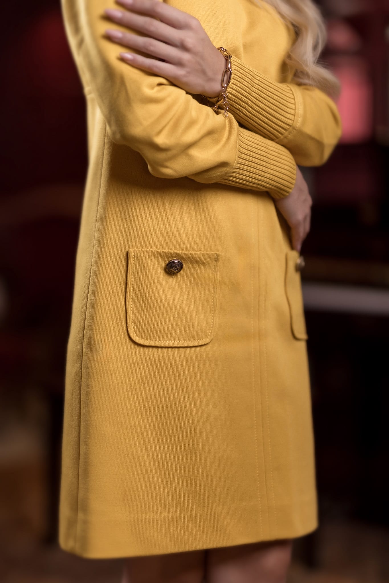 model wearing yellow knit midi dress