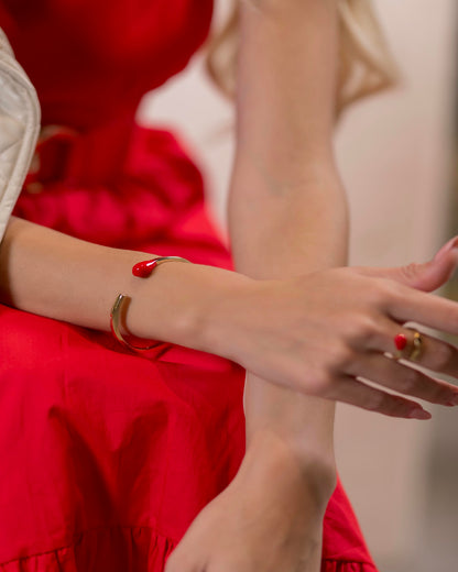 Scarlet Solitude – Gold Cuff and Ring Set with Red Accents