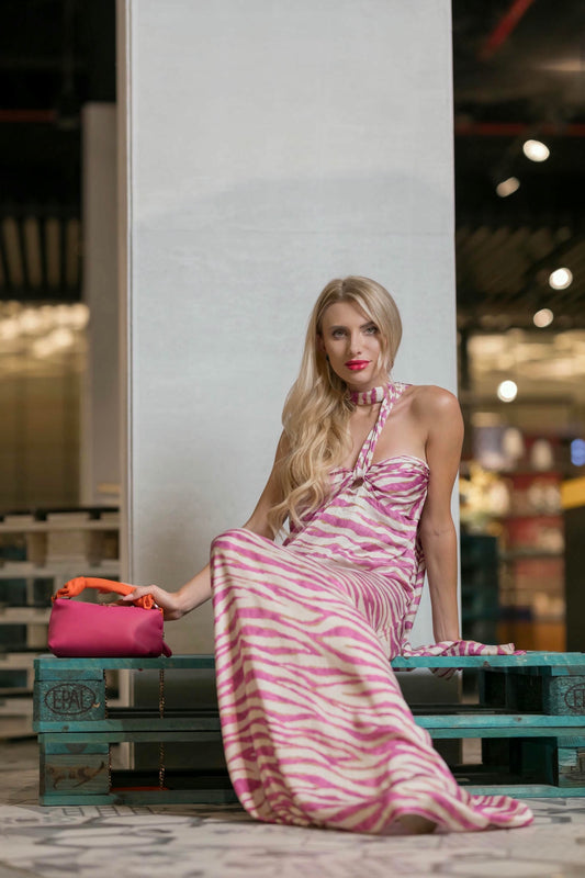 a model wearing a Pink Zebra Maxi Silk Dress