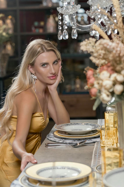 a model wearing a Satin Gown with Tie-Back in Warm Gold