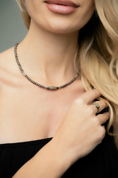 set of necklace and matching ring silver beads and gold from viola tresor collection