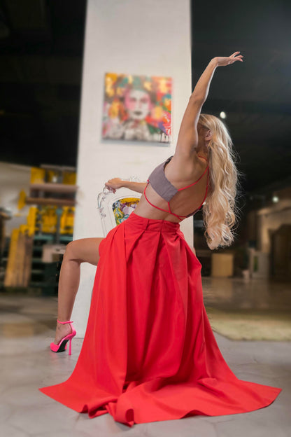 a model wearing a Red Maxi Skirt and Lilac Halter Top Set